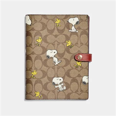 replica coach snoopy|Snoopy coach notebook.